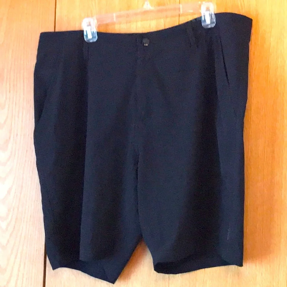 Oakley size 40 black stretch nylon 9.5” hybrid cargo board shorts swim water EUC